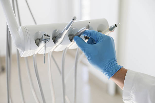 Professional Emergency Dentist technician working in Allegan, MI